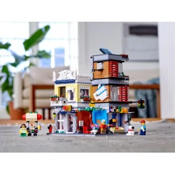 Byhus med dyrehandel og caf