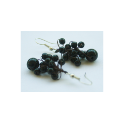 reringe lange med sorte perler