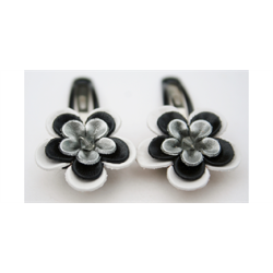 Hrspnder med lder blomst i gr, sort og slv.