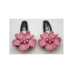 Hrspnder med lder blomst i lyserd.